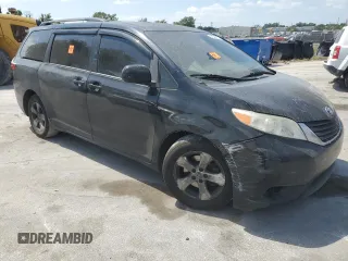 2015 Toyota Sienna LE AAS with VIN 5TDKK3DC3FS653209, listed as a Copart auction lot 54242095 with 228,634 mi miles and Salvage Title. Bid and sale history available at DreamBid. Image 4.