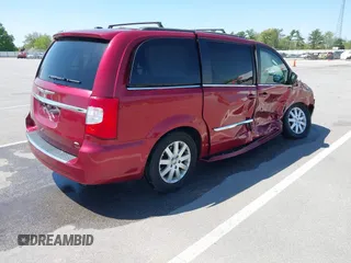 2014 Chrysler Town & Country Touring z VIN 2C4RC1BG7ER433956, wystawiony jako IAAI lot #42230097 z przebiegiem 107 737 mil mil oraz . Historia ofert i sprzedaży dostępna na DreamBid. Obrazek 4.