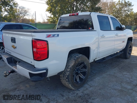 2017 Chevrolet Silverado 1500 LT with VIN 3GCUKREC4HG466329, listed as a IAAI auction lot 41305052 with 57,844 mi miles and . Bid and sale history available at DreamBid. Image 4.