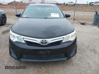 2014 Toyota Camry L with VIN 4T4BF1FK2ER390414, listed as a IAAI auction lot 41936368 with 164,811 mi miles and . Bid and sale history available at DreamBid. Image 12.