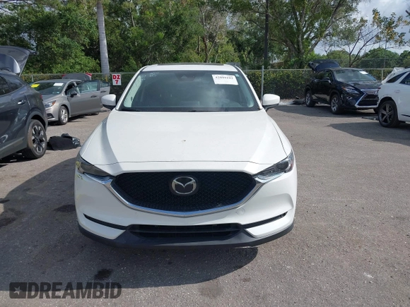2018 Mazda CX-5 Grand Touring with VIN JM3KFBDM6J0451605, listed as a IAAI auction lot 42099182 with 81,703 mi miles and . Bid and sale history available at DreamBid. Image 12.