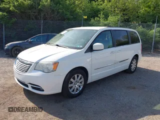 2013 Chrysler Town & Country Touring with VIN 2C4RC1BG9DR744836, listed as a IAAI auction lot 42104087 with 159,482 mi miles. Bid and sale history available at carsss.com. Image 2.
