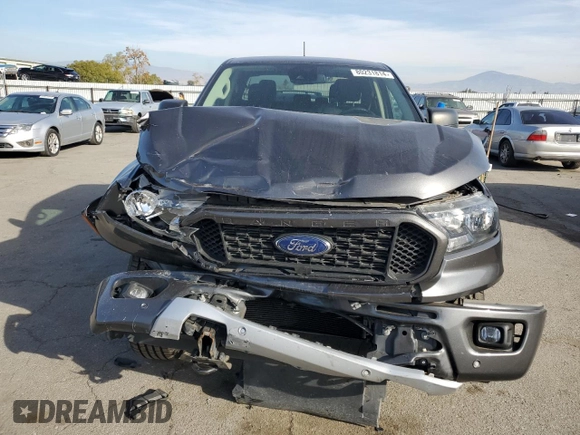 2019 Ford Ranger XL с VIN 1FTER4EHXKLA94617, выставлен на аукционе Copart как лот 80231814 с пробегом 93 853 миль миль и Списание • Salvage title. История ставок и продаж доступна на DreamBid. Изображение 5.