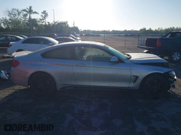 2015 BMW 4 Series 428i xDrive z VIN WBA3N9C56FK246118, wystawiony jako IAAI lot #41923623 z przebiegiem 113 207 mil mil oraz . Historia ofert i sprzedaży dostępna na DreamBid. Obrazek 14.