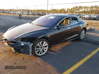 2013 Tesla Model S with VIN 5YJSA1CN7DFP22690, listed as a IAAI auction lot 40981089 with 188,057 mi miles. Bid and sale history available at carsss.com. Image 20.