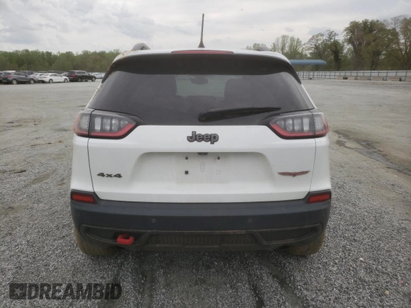 2019 Jeep Cherokee Trailhawk z VIN 1C4PJMBX9KD256968, wystawiony jako Copart lot #51591025 z przebiegiem 110 746 mil mil oraz Szkoda całkowita • Salvage title. Historia ofert i sprzedaży dostępna na DreamBid. Obrazek 6.