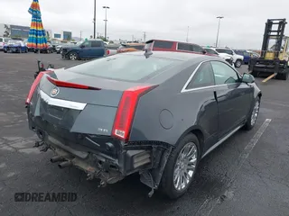 2011 Cadillac CTS Performance with VIN 1G6DJ1ED7B0126314, listed as a IAAI auction lot 42185363 with 80,676 mi miles and . Bid and sale history available at DreamBid. Image 4.