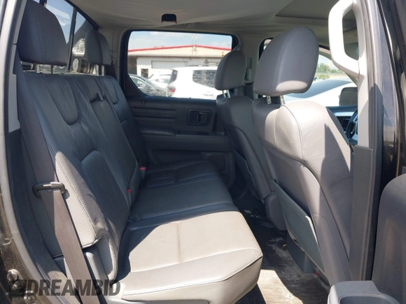 2008 Honda Ridgeline RTL z VIN 2HJYK16508H535399, wystawiony jako IAAI lot #42298407 z przebiegiem 188 820 mil mil oraz . Historia ofert i sprzedaży dostępna na DreamBid. Obrazek 8.