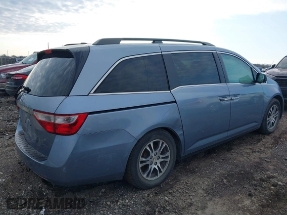 2012 Honda Odyssey EX-L with VIN 5FNRL5H60CB051959, listed as a IAAI auction lot 41967908 with Not Provided miles and . Bid and sale history available at carsss.com. Image 4.
