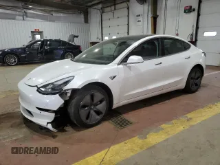 2019 Tesla Model 3 Mid Range z VIN 5YJ3E1EA4KF309822, wystawiony jako Copart lot #56568075 z przebiegiem 90 401 mil mil oraz Szkoda całkowita • Salvage title. Historia ofert i sprzedaży dostępna na DreamBid. Obrazek 1.