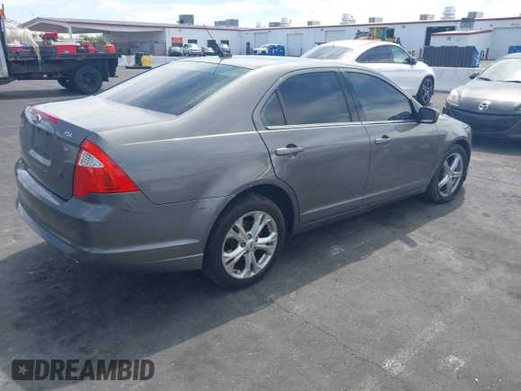 2012 Ford Fusion SE with VIN 3FAHP0HA6CR305816, listed as a IAAI auction lot 42041656 with 275,172 mi miles. Bid and sale history available at carsss.com. Image 4.
