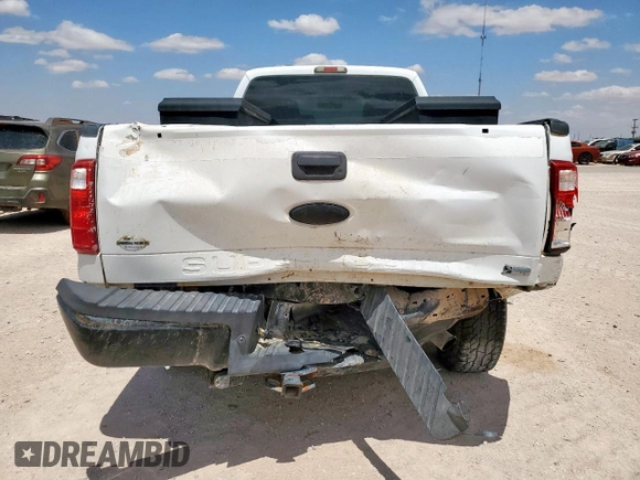 2011 Ford F-250 XL with VIN 1FT7X2B68BEC76102, listed as a Copart auction lot 60262675 with 283,615 mi miles and Salvage title. Bid and sale history available at DreamBid. Image 6.