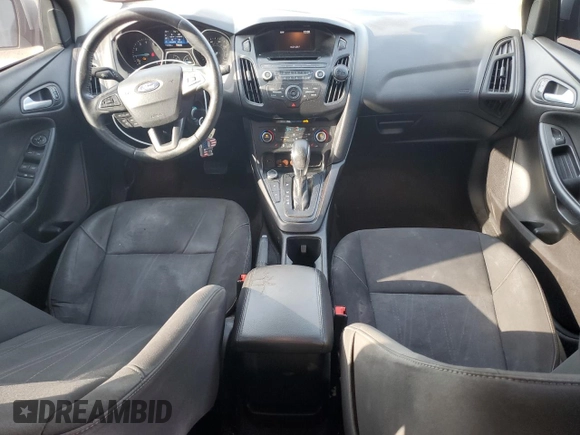 2017 Ford Focus SE with VIN 1FADP3FE9HL273889, listed as a Copart auction lot 53737055 with 114,700 mi miles and Salvage Title. Bid and sale history available at DreamBid. Image 8.