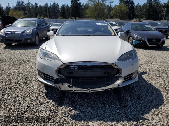 2014 Tesla Model S 60 with VIN 5YJSA1H12EFP51909, listed as a Copart auction lot 55489705 with Not Provided miles and Clean Title. Bid and sale history available at DreamBid. Image 5.