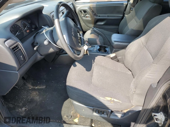 2004 Jeep Grand Cherokee Laredo z VIN 1J4GW48S24C217901, wystawiony jako Copart lot #60436675 z przebiegiem 263 837 mil mil oraz Szkoda całkowita • Salvage title. Historia ofert i sprzedaży dostępna na DreamBid. Obrazek 7.