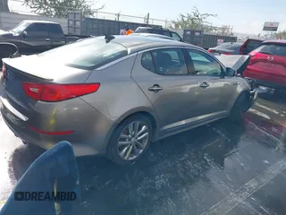 2015 Kia Optima SX Turbo with VIN 5XXGR4A69FG474261, listed as a IAAI auction lot 41103677 with 119,988 mi miles. Bid and sale history available at carsss.com. Image 4.