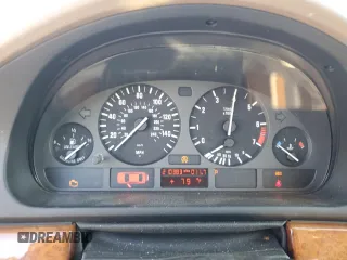 1999 BMW 5 Series 528iAt with VIN WBADP6330XBV61784, listed as a Copart auction lot 77685734 with 210,383 mi miles and Salvage Title. Bid and sale history available at carsss.com. Image 9.
