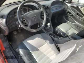 1999 Ford Mustang GT with VIN 1FAFP42X8XF151298, listed as a Copart auction lot 76350444 with 0 mi miles and Salvage Title. Bid and sale history available at carsss.com. Image 8.