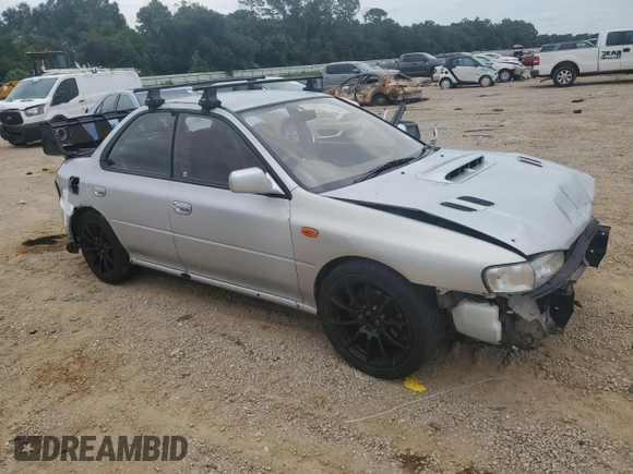 1995 Subaru Impreza with VIN GC8030988, listed as a Copart auction lot 70242354 with 123,696 mi miles and Salvage title. Bid and sale history available at DreamBid. Image 4.