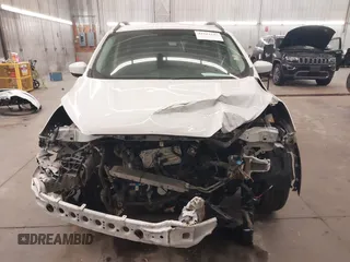 2018 Ford Escape SE z VIN 1FMCU9GD2JUB17518, wystawiony jako IAAI lot #41919245 z przebiegiem 102 626 mil mil oraz . Historia ofert i sprzedaży dostępna na DreamBid. Obrazek 13.