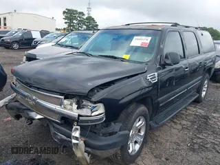 2001 Chevrolet Suburban LS z VIN 1GNEC16T21J217198, wystawiony jako IAAI lot #41779416 z przebiegiem 306 172 mil mil oraz . Historia ofert i sprzedaży dostępna na DreamBid. Obrazek 2.