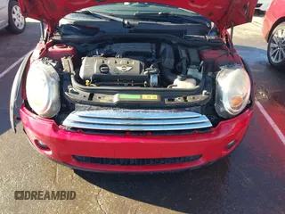 2009 MINI Convertible with VIN WMWMR33569TU95961, listed as a IAAI auction lot 41689845 with 107,934 mi miles and . Bid and sale history available at DreamBid. Image 10.