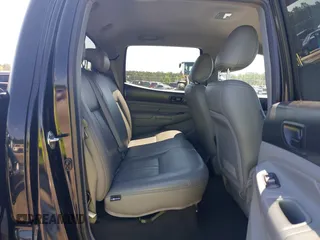 2015 Toyota Tacoma z VIN 3TMLU4EN3FM186765, wystawiony jako IAAI lot #42235553 z przebiegiem 183 878 mil mil oraz . Historia ofert i sprzedaży dostępna na DreamBid. Obrazek 8.