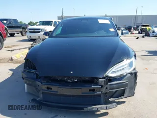 2021 Tesla Model S Long Range Plus with VIN 5YJSA1E28MF426080, listed as a IAAI auction lot 41979326 with 125,328 mi miles and . Bid and sale history available at DreamBid. Image 13.
