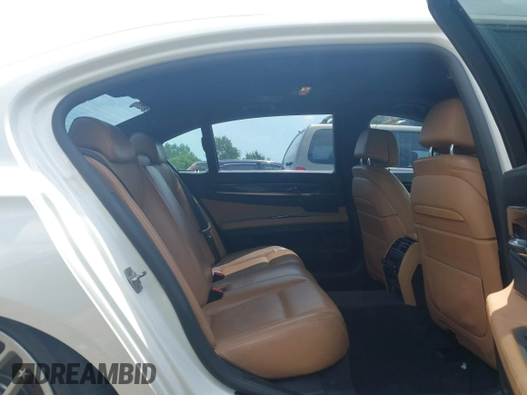 2015 BMW 7 Series 750Li xDrive with VIN WBAYF8C57FD655004, listed as a IAAI auction lot 42272205 with 77,677 mi miles and . Bid and sale history available at DreamBid. Image 8.