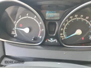 2019 Ford Fiesta SE z VIN 3FADP4BJ2KM147288, wystawiony jako Copart lot #55391125 z przebiegiem 83 887 mil mil oraz Szkoda całkowita • Salvage title. Historia ofert i sprzedaży dostępna na DreamBid. Obrazek 9.