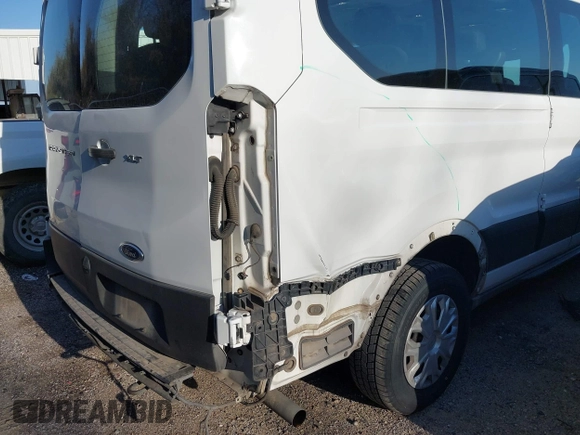 2021 Ford Transit Passenger XL z VIN 1FBAX2Y89MKA49850, wystawiony jako IAAI lot #41602893 z przebiegiem 74 248 mil mil oraz . Historia ofert i sprzedaży dostępna na DreamBid. Obrazek 6.