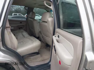 2002 Chevrolet Tahoe LT with VIN 1GNEC13Z22J256805, listed as a IAAI auction lot 41302460 with 249,578 mi miles and . Bid and sale history available at DreamBid. Image 8.