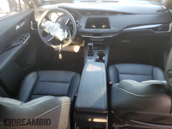2022 Cadillac XT4 FWD Luxury with VIN 1GYAZAR45NF136810, listed as a Copart auction lot 74359664 with 10,552 mi miles and Salvage title. Bid and sale history available at DreamBid. Image 8.