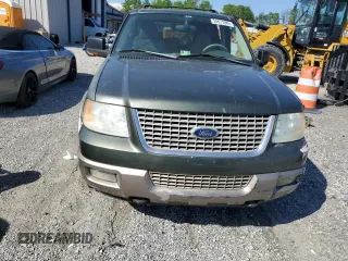 2003 Ford Expedition Eddie Bauer z VIN 1FMFU18L23LC21326, wystawiony jako Copart lot #54671085 z przebiegiem 186 518 mil mil oraz Szkoda całkowita • Salvage title. Historia ofert i sprzedaży dostępna na DreamBid. Obrazek 5.