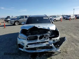 2017 BMW X5 M z VIN 5YMKT6C39H0X20537, wystawiony jako Copart lot #41470195 z przebiegiem 86 386 mil mil oraz Szkody całkowita. Historia ofert i sprzedaży dostępna na DreamBid. Obrazek 11.