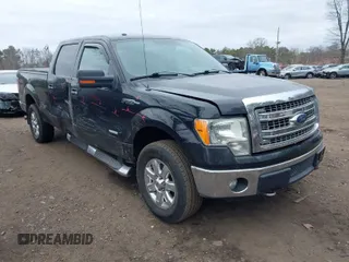 2013 Ford F-150 XL with VIN 1FTFW1ET4DFB13826, listed as a IAAI auction lot 42010957 with 209,848 mi miles. Bid and sale history available at carsss.com. Image 1.