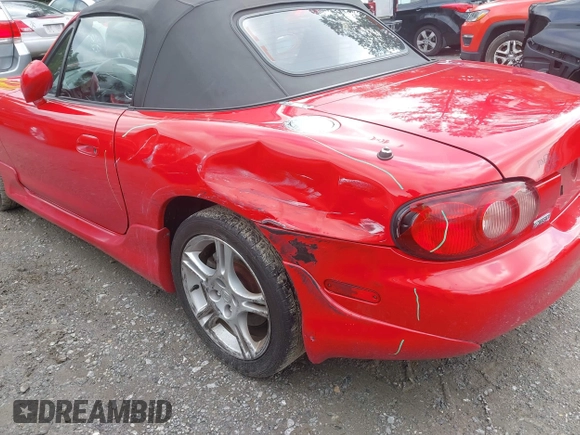 2004 Mazda MX-5 Miata LS with VIN JM1NB353440401450, listed as a IAAI auction lot 42542318 with 106,950 mi miles and . Bid and sale history available at DreamBid. Image 12.
