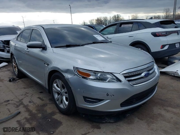 2010 Ford Taurus SEL with VIN 1FAHP2EW7AG151794, listed as a IAAI auction lot 41837109 with 129599 miles. Bid and sale history available at carsss.com. Image 1.