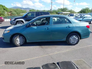 2009 Toyota Corolla with VIN 1NXBU40E39Z119288, listed as a IAAI auction lot 40477607 with 76,584 mi miles. Bid and sale history available at carsss.com. Image 13.