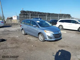 2012 Mazda Mazda5 Sport with VIN JM1CW2BL7C0105928, listed as a IAAI auction lot 42061224 with 59,993 mi miles. Bid and sale history available at carsss.com. Image 1.