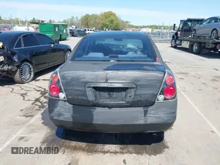 2003 Nissan Altima S with VIN 1N4AL11D03C129562, listed as a IAAI auction lot 41911150 with 205,862 mi miles. Bid and sale history available at carsss.com. Image 16.