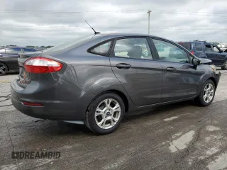2015 Ford Fiesta SE z VIN 3FADP4BJ2FM114569, wystawiony jako Copart lot #56785265 z przebiegiem 71 045 mil mil oraz Szkoda całkowita • Salvage title. Historia ofert i sprzedaży dostępna na DreamBid. Obrazek 3.