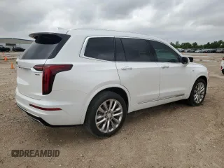 2021 Cadillac XT6 Premium Luxury with VIN 1GYKPCRSXMZ169206, listed as a Copart auction lot 55953525 with 64,789 mi miles and Salvage Title. Bid and sale history available at DreamBid. Image 3.