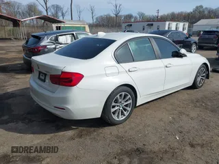 2018 BMW 3 Series 320i xDrive with VIN WBA8E5G53JNV03347, listed as a IAAI auction lot 41908985 with 122,111 mi miles. Bid and sale history available at carsss.com. Image 4.