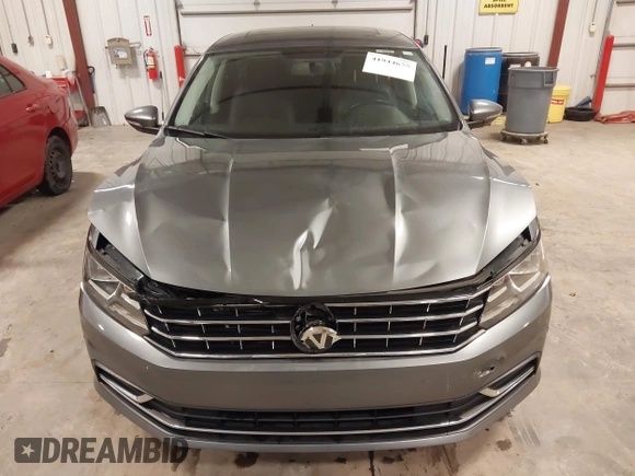 2017 Volkswagen Passat 1.8T SE with VIN 1VWBT7A38HC054123, listed as a IAAI auction lot 41944675 with 67,035 mi miles. Bid and sale history available at carsss.com. Image 12.