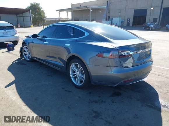 2014 Tesla Model S 60 with VIN 5YJSA1S10EFP32851, listed as a IAAI auction lot 41730746 with 91,657 mi miles and . Bid and sale history available at DreamBid. Image 3.