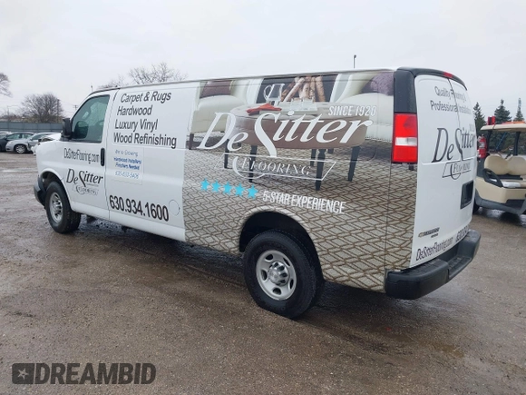 2016 Chevrolet Express Cargo Van with VIN 1GCWGBFF8G1135759, listed as a IAAI auction lot 41452031 with 96,893 mi miles. Bid and sale history available at carsss.com. Image 3.