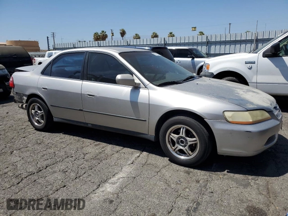 1999 Honda Accord LX z VIN JHMCG5549XC040487, wystawiony jako Copart lot #67415984 z przebiegiem 205 698 mil mil oraz Szkoda całkowita • Salvage title. Historia ofert i sprzedaży dostępna na DreamBid. Obrazek 4.