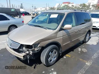 2001 Honda Odyssey EX z VIN 2HKRL18611H553161, wystawiony jako IAAI lot #42339181 z przebiegiem 89 235 mil mil oraz . Historia ofert i sprzedaży dostępna na DreamBid. Obrazek 2.