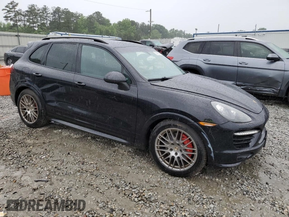2013 Porsche Cayenne GTS с VIN WP1AD2A23DLA75220, выставлен на аукционе Copart как лот 55745765 с пробегом Не указан миль и Списание • Salvage title. История ставок и продаж доступна на DreamBid. Изображение 4.